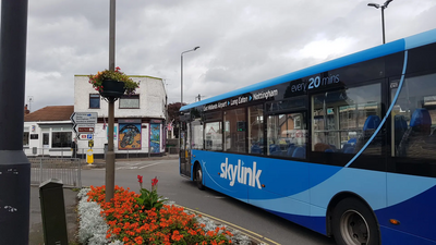 Skylink bus passes Long Eaton Railway Station