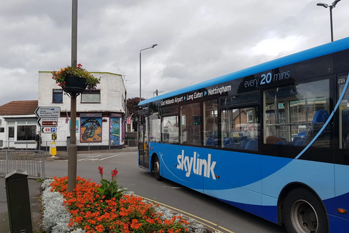 Skylink bus passes Long Eaton Railway Station